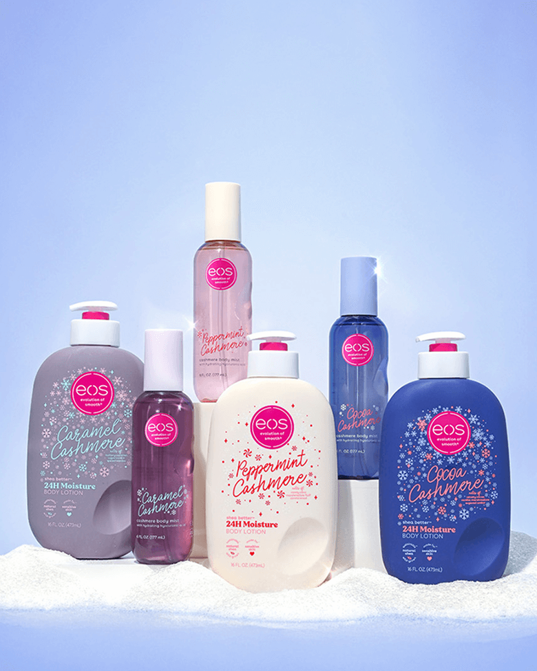 eos holiday collection of body mist and body lotions on blue background